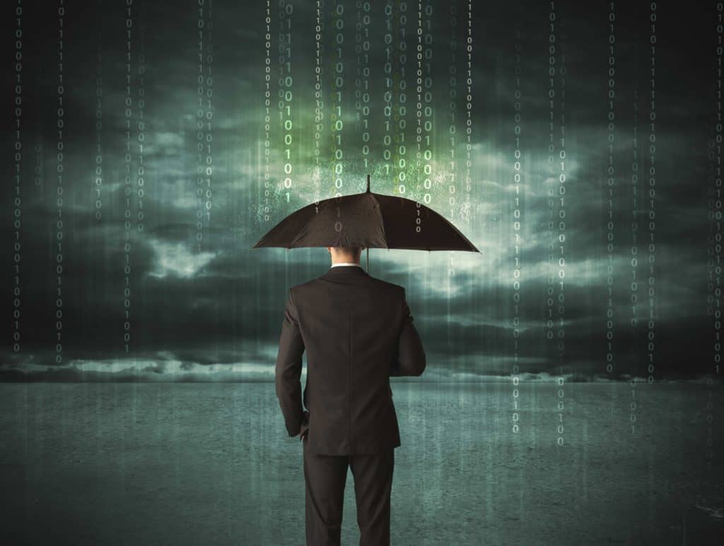 Business man in data rain